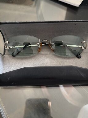 Cartier Men's Rimless Sunglasses with Green Lenses